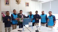 Staff PLN dan DPC Perindo foto bersama